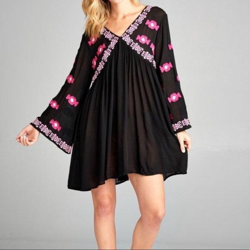NWT V NECK DRESS WITH TASSELS